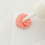 Embellish your place card with a flower.